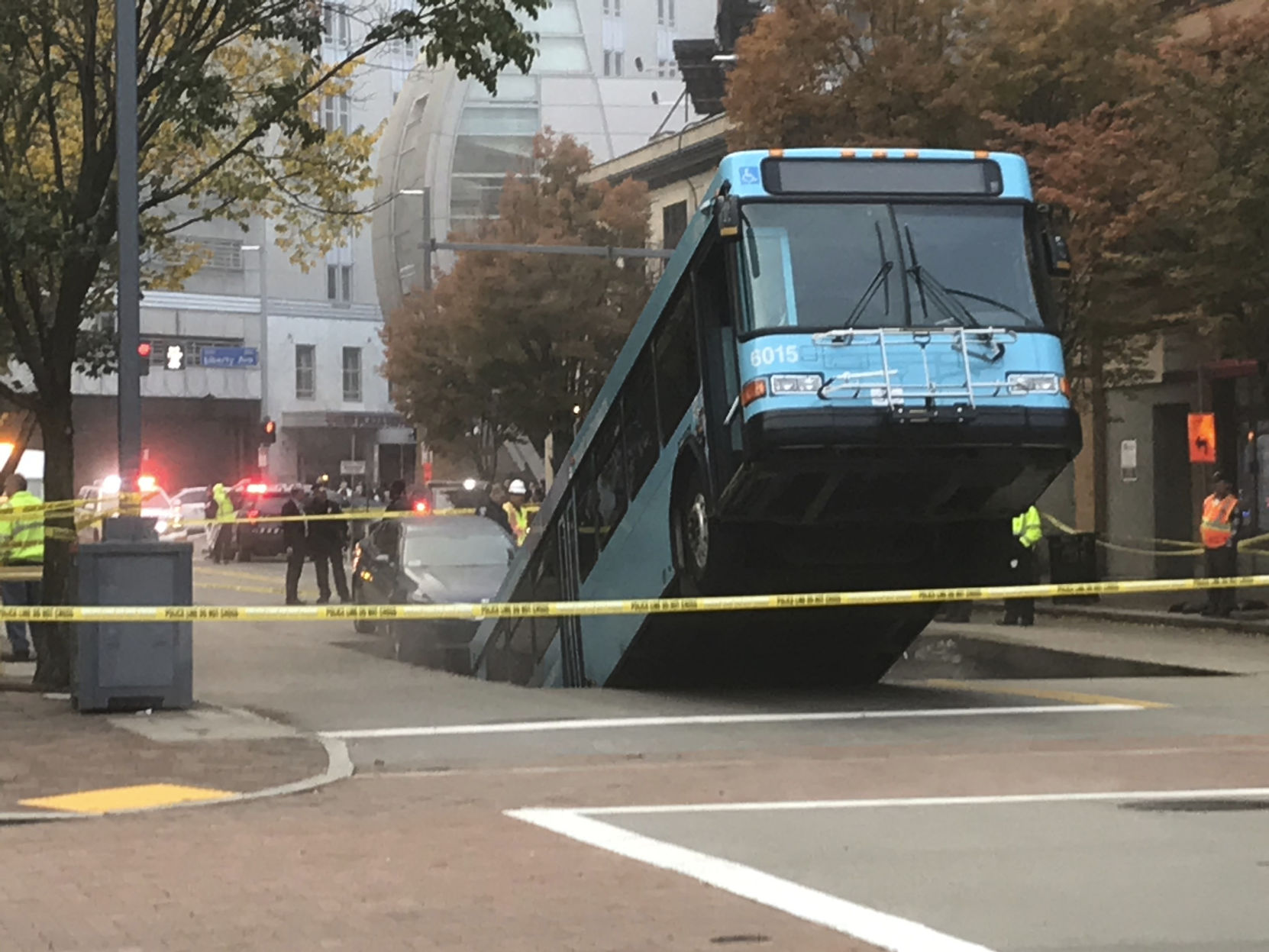 APTOPIX Commuter Bus-Sinkhole